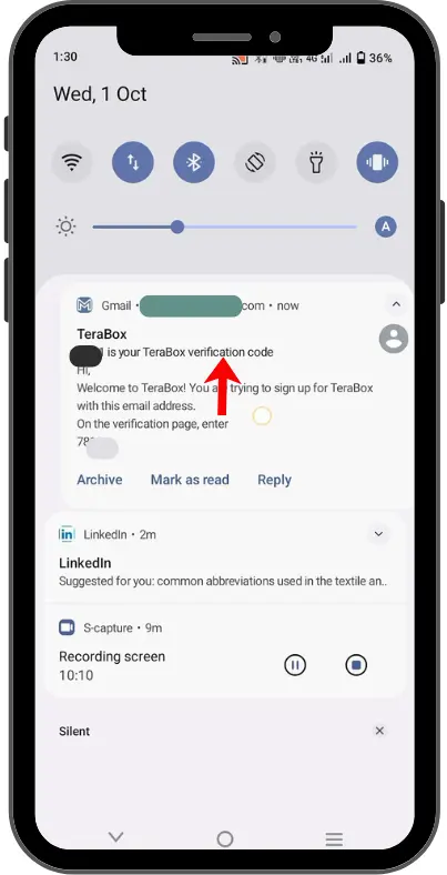 Smartphone notification panel displaying a TeraBox email verification code message received in Gmail.
